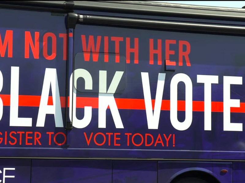 A 'Blacks for Trump' campaign bus sits in a Baltimore parking lot. Screenshot from video by Stephen Janis