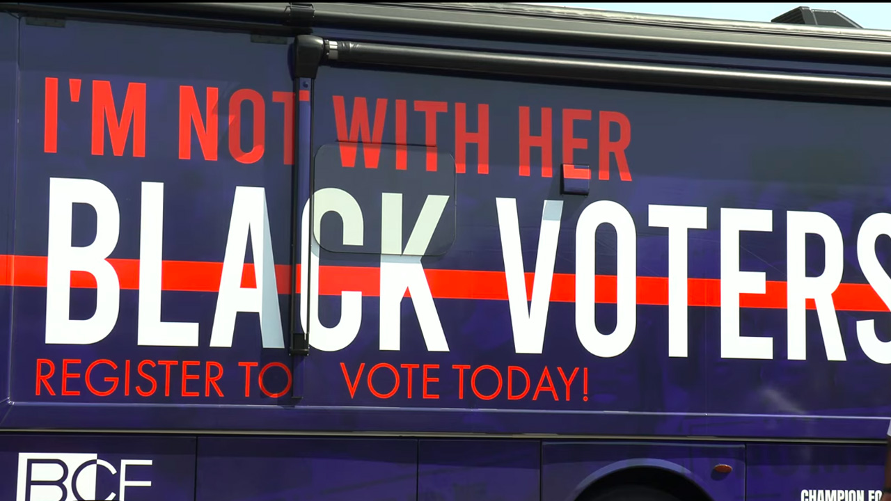 A 'Blacks for Trump' campaign bus sits in a Baltimore parking lot. Screenshot from video by Stephen Janis