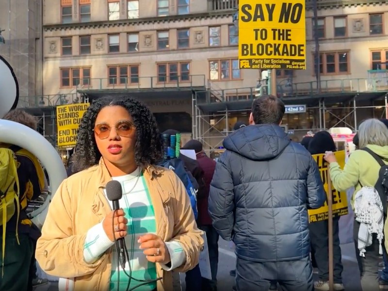 Protesters rally outside Grand Central Station in New York City to call for an end to the blockade of Cuba.