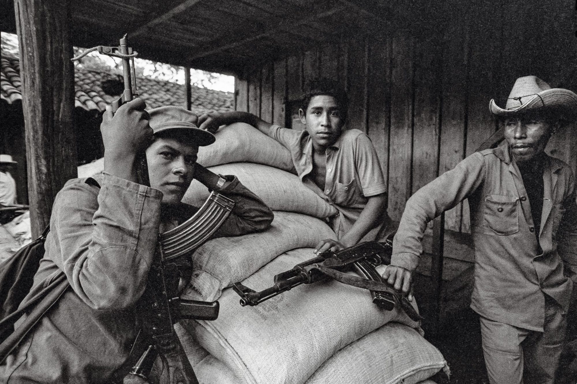 Members of a Sandinista "Auto-Defense" farming cooperative brandish AK-47s to defend against attacks by U.S.-backed Contra reblels, Esteli Department, Nicaragua. Photo by Scott Wallace/Getty Images