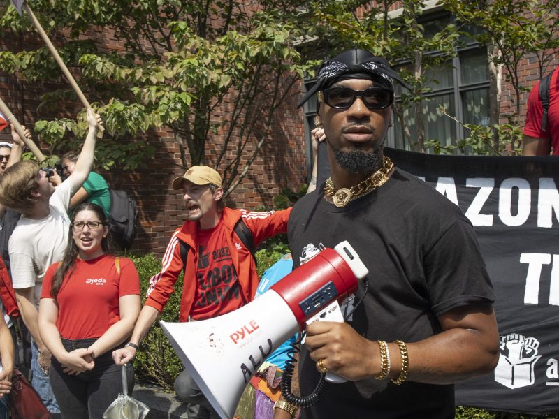 Chris Smalls, a leader of the Amazon Labor Union, leads a march of Starbucks and Amazon workers and their allies to the homes of their CEOs to protest union busting on Labor Day, September 5, 2022, in New York City, New York. Photo by Andrew Lichtenstein/Corbis via Getty Images