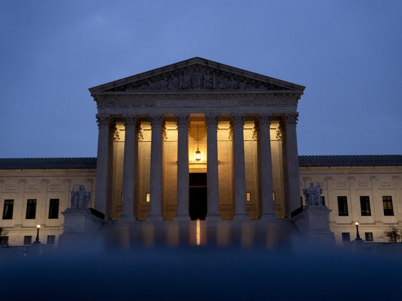 Photo of the US Supreme Court Court in Washington, DC, at dusk.