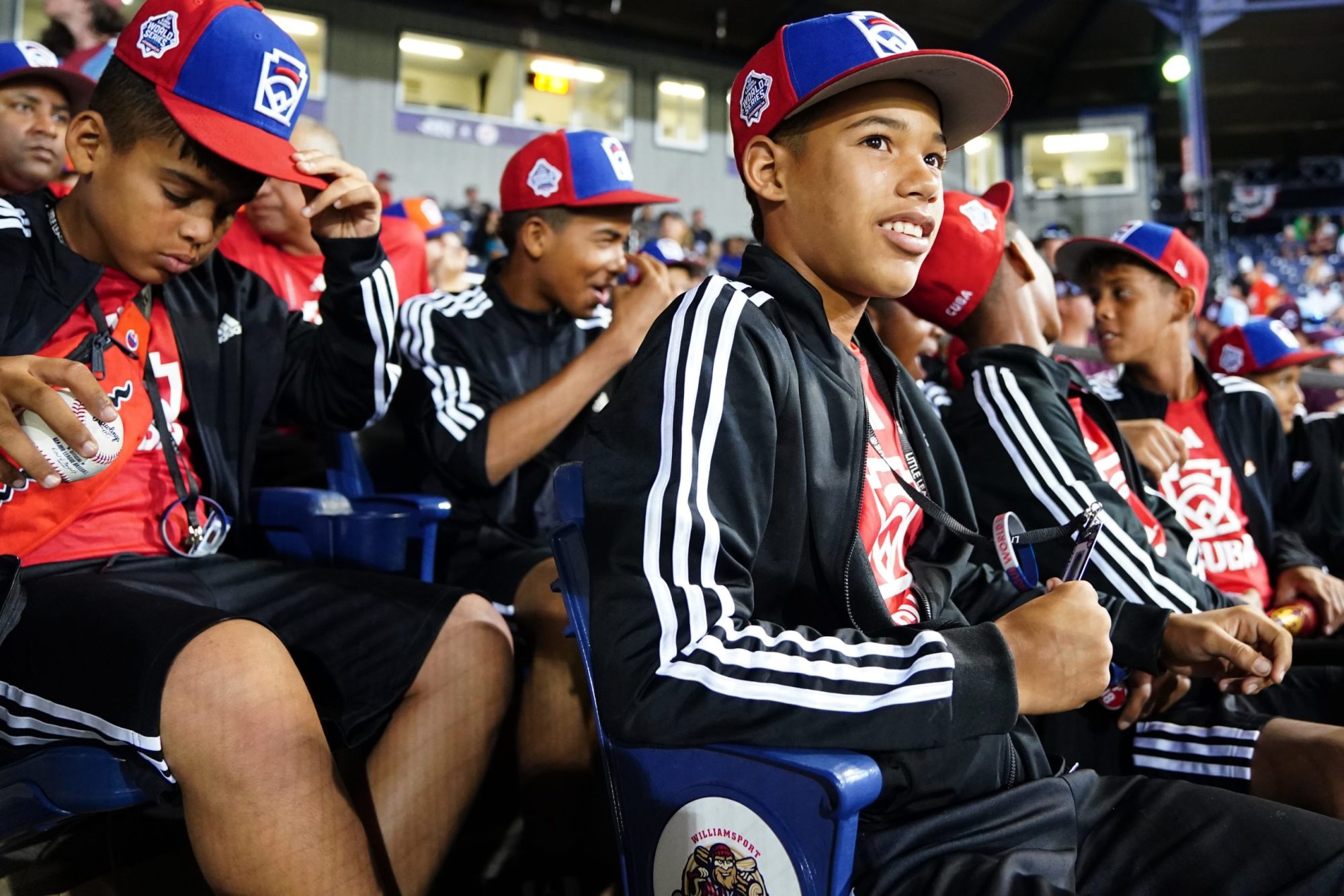 A member of Team Cuba looks on during the 2023 Little League Classic between the Philadelphia Phillies and the Washington Nationals at Muncy Bank Ballpark at Historic Bowman Field on Sunday, August 20, 2023 in Williamsport, Pennsylvania. Photo by Katherine Woolson/MLB Photos via Getty Images