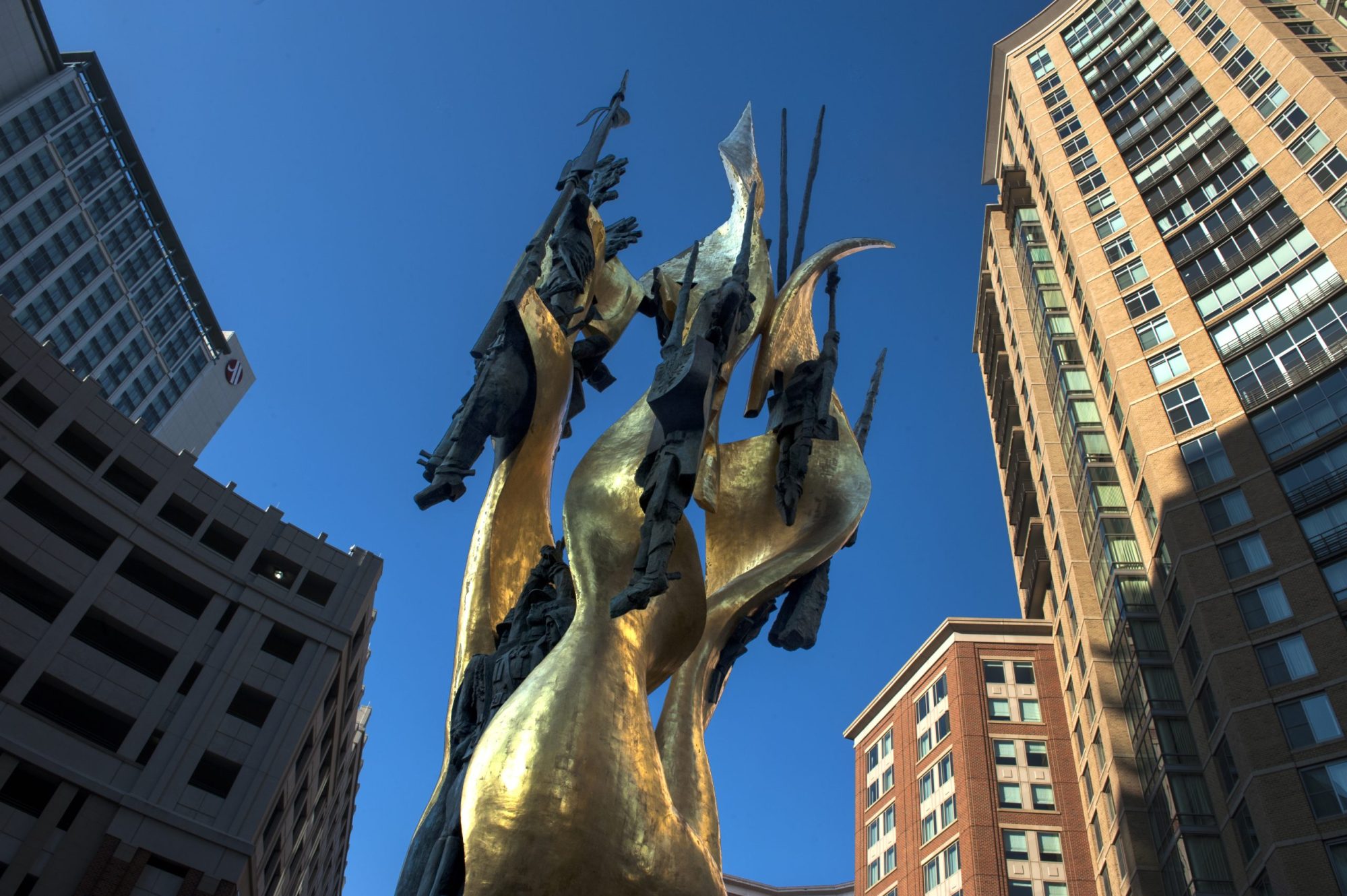 The Katyn Memorial rises from the circle in Harbor East Wednesday, Feb. 14, 2013, in Baltimore, Maryland.