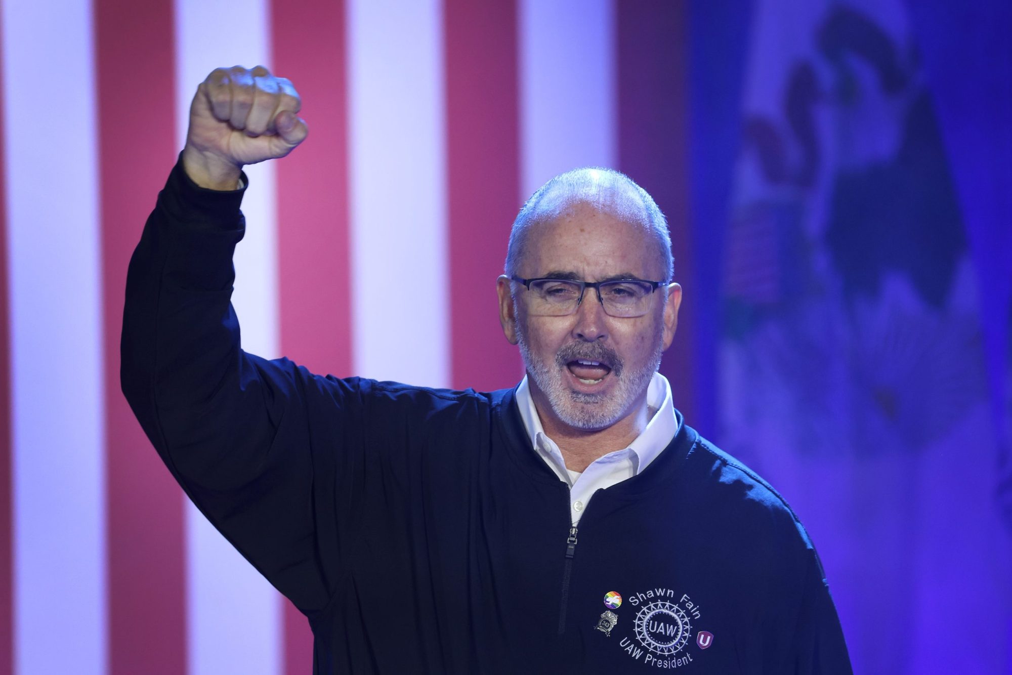 United Auto Workers (UAW) President Shawn Fain speaks to auto workers before the arrival of President Joe Biden at the Community Complex Building on November 9, 2023, in Belvidere, Illinois. Biden was in Belvidere to celebrate the scheduled reopening of Stellantis' Belvidere Assembly Plant and the settlement of the United Auto Workers (UAW) strike.