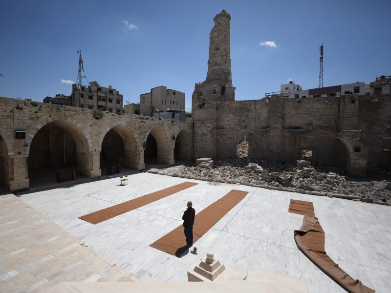 A view of damage as Palestinians gather to read the Holy Qur'an during the last days of Ramadan, in the remaining part of the historic 'Great Omari Mosque,' also known as the 'Great Mosque of Gaza,' following its destruction by Israeli military bombardments in Gaza on April 06, 2024. Photo by Dawoud Abo Alkas/Anadolu via Getty Images