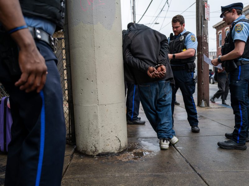 Police arrest a man as the city of Philadelphia begins a long anticipated clearing of the drug encampment in the Kensington section of Philadelphia on May 08, 2024, in Philadelphia, Pennsylvania.