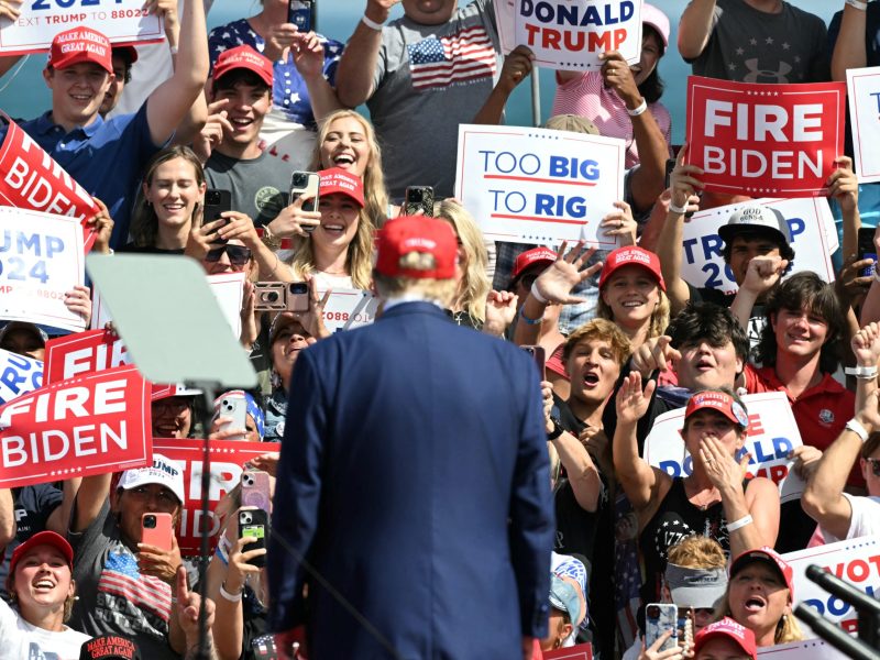 Supporters of former US President and Republican presidential candidate Donald Trump cheer as he arrives to speak at a campaign event in Racine, Wisconsin, on June 18, 2024. Photo by JIM WATSON/AFP via Getty Images