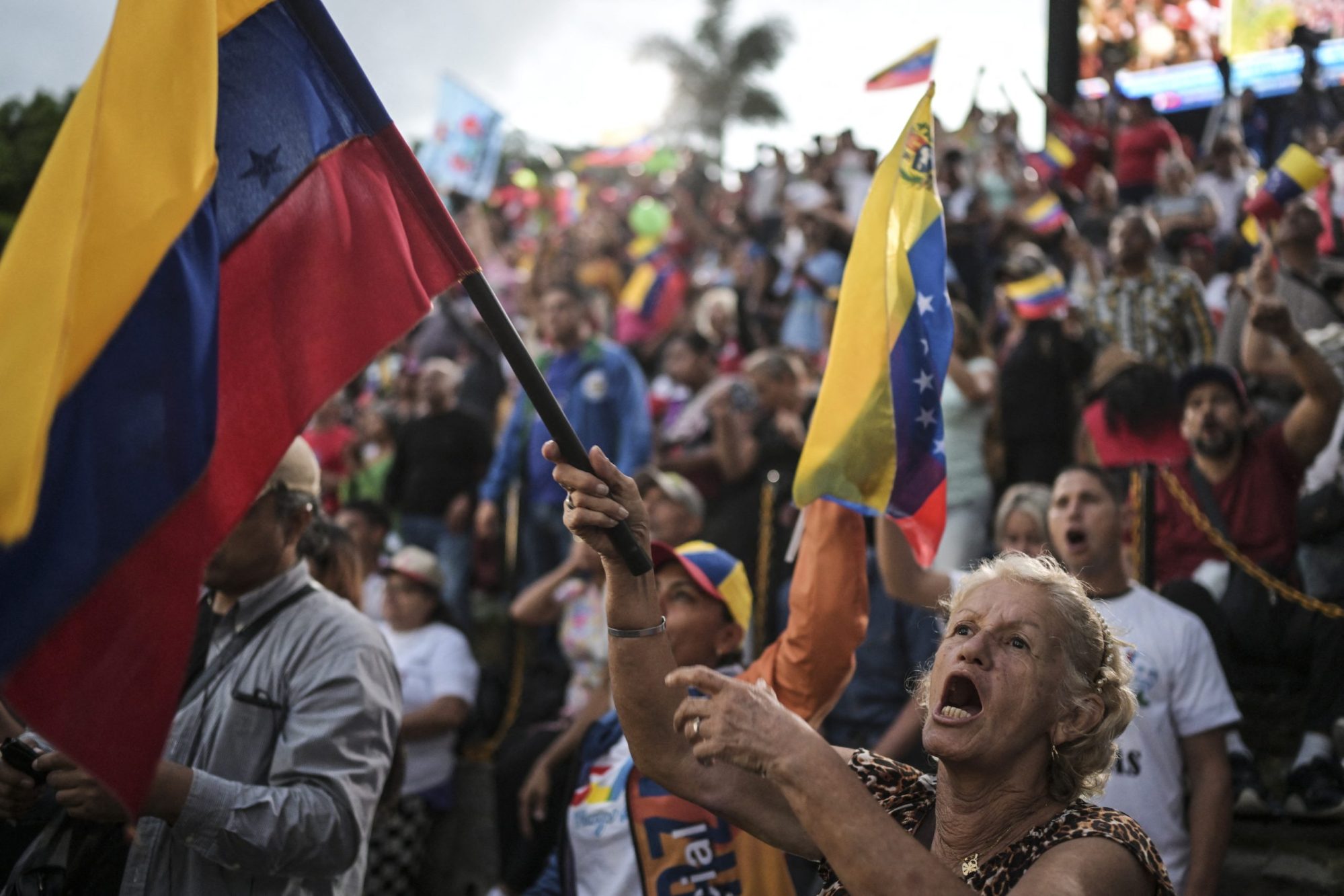 Supporters of Venezuelan President Nicolas Maduro shout slogans while they listen to a speech during a rally at the Miraflores presidential palace in Caracas on August 1, 2024. Photo by YURI CORTEZ/AFP via Getty Images