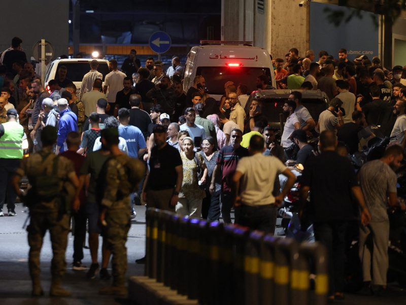 People gather at the entrance of the American University of Beirut Medical Center, on September 17, 2024, after explosions hit locations in several Hezbollah strongholds around Lebanon. Photo by ANWAR AMRO/AFP via Getty Images