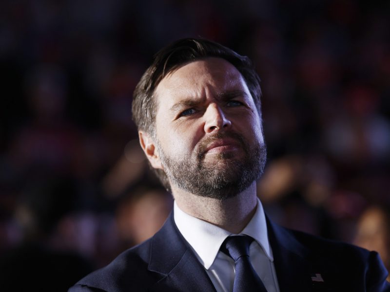 Republican vice presidential candidate Sen. JD Vance listens as Republican presidential nominee, former President Donald Trump speaks at a campaign rally at the Butler Farm Show fairgrounds on October 05, 2024 in Butler, Pennsylvania. Photo by Anna Moneymaker/Getty Images