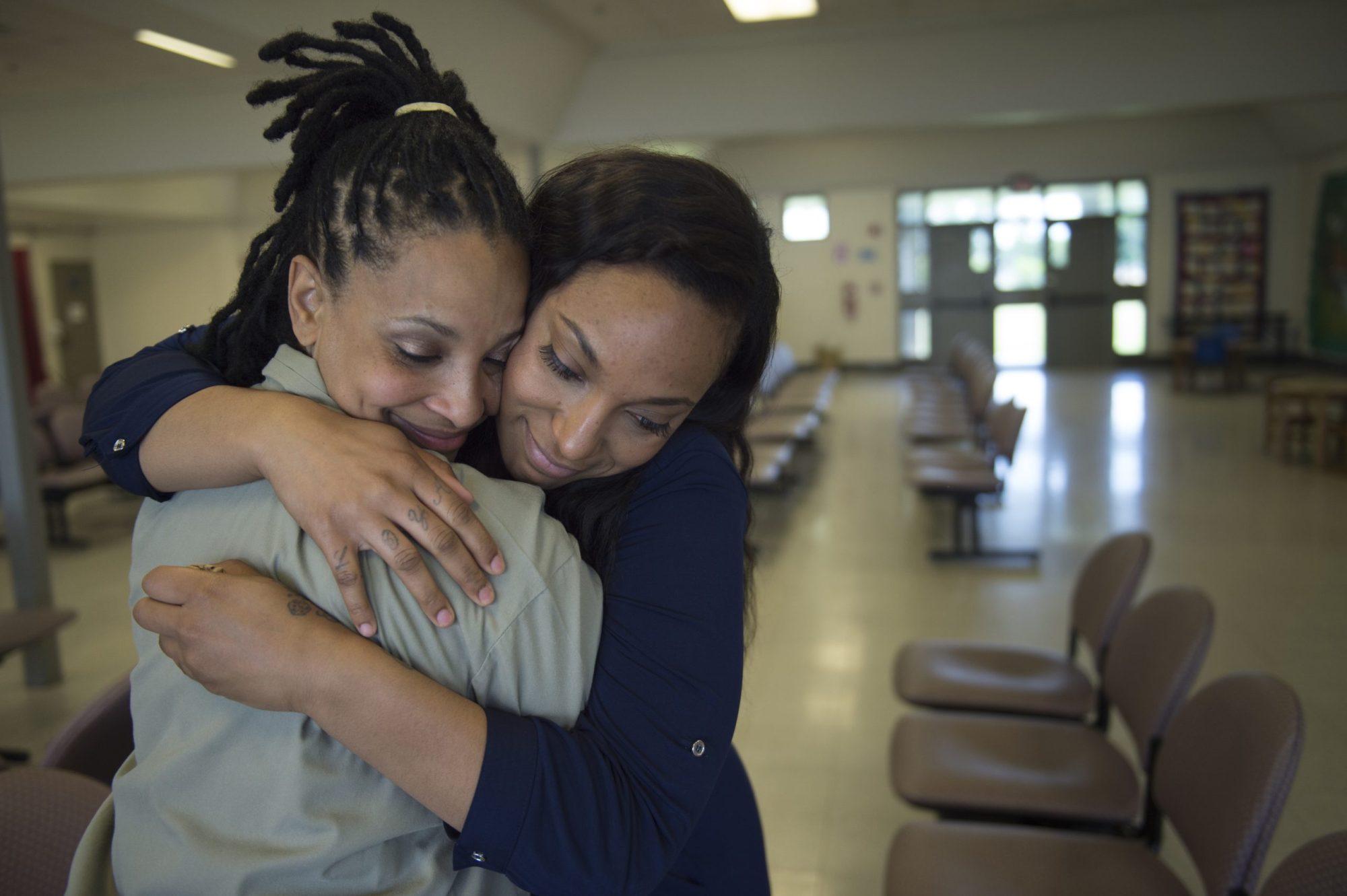 Sharanda Jones hugs her daughter Clenesha Garland, 24, goodbye after a visit at Carswell Federal Prison in Fort Worth, Texas, on Wednesday, June 10, 2015. Photo by Nikki Kahn/The Washington Post via Getty Images