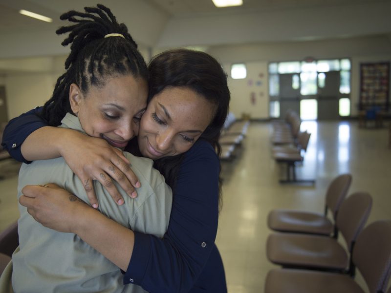 Sharanda Jones hugs her daughter Clenesha Garland, 24, goodbye after a visit at Carswell Federal Prison in Fort Worth, Texas, on Wednesday, June 10, 2015. Photo by Nikki Kahn/The Washington Post via Getty Images