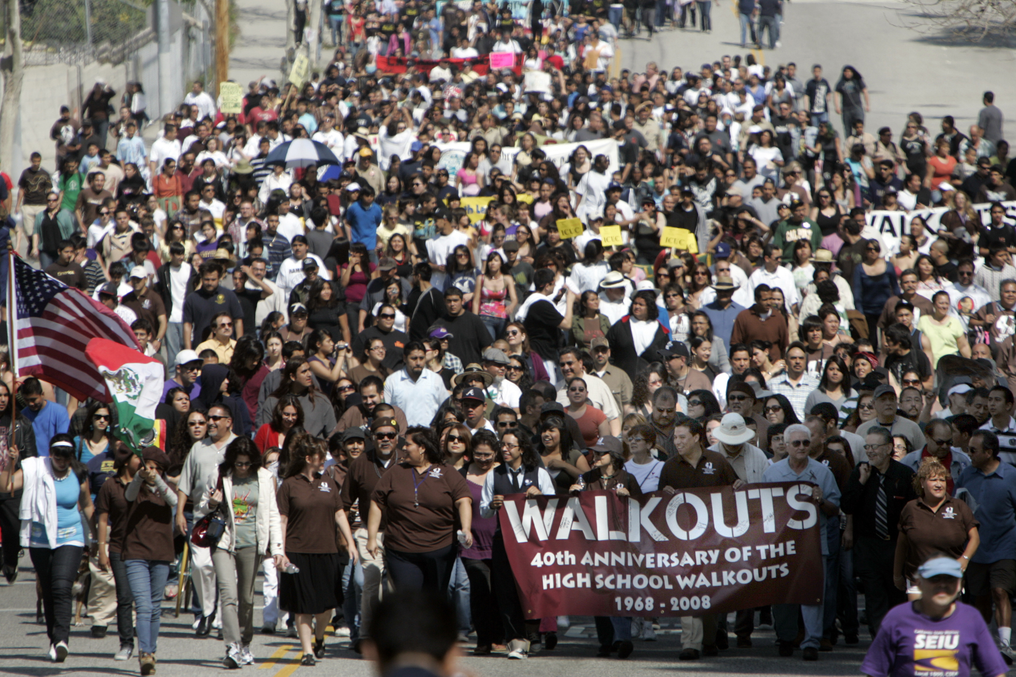 Over a thousand marchers turn up Eastlake Avenue on their way to Hazard Park. The march from Lincoln High School commemorates the 1968 East LA school walkout which launched the Chicano Civil Rights Movement. Photo by Annie Wells/Los Angeles Times via Getty Images