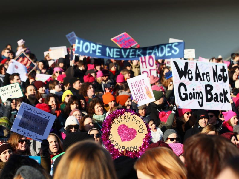 Demonstrators with a sign saying " Not my President, We are not going back, hope never fades and everybody love everybody " make their way from the iamsterdam statue in front of the Rijksmuseum towards US Consulate during the Women's March held at Museumplein on January 21, 2017 in Amsterdam, Netherlands. Photo by Dean Mouhtaropoulos/Getty Images