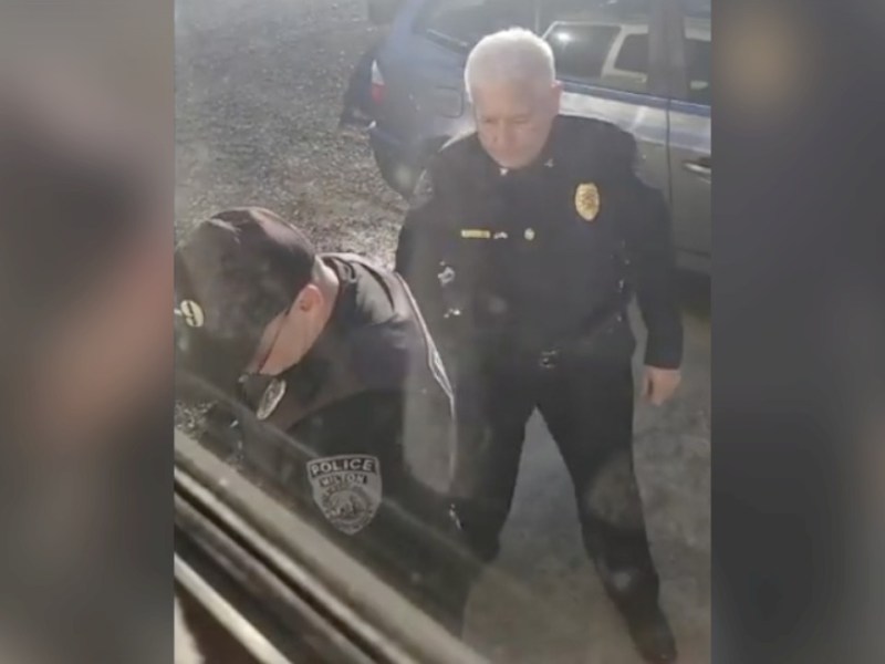 An officer with the Milton, WV Police Department conducts a raid on the camper of Coty Cecil. Photo courtesy of Coty Cecil