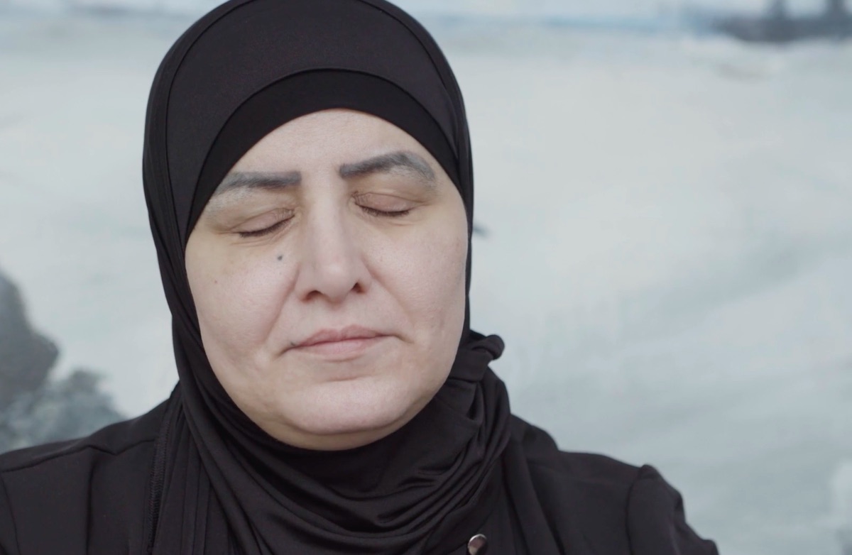 A woman in the West Bank closes her eyes during an interview for Palestine Remembers, a forthcoming documentary from Shadowgraph