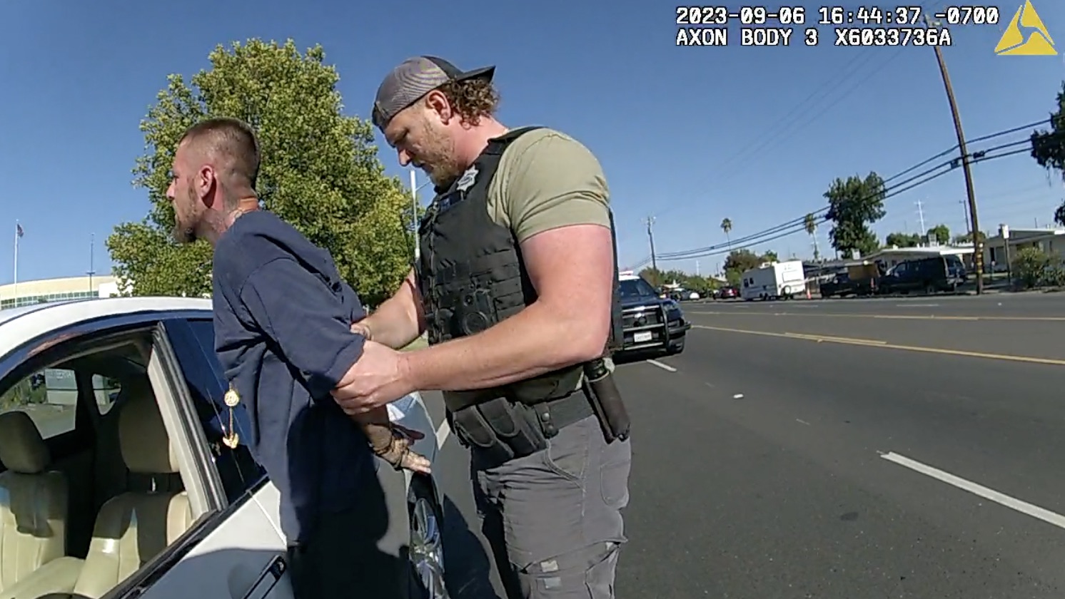 An officer with the Sacramento Sheriff's Office's Gang Suppression Unit arrests Jacob Palkovic after stopping his car at gunpoint. Photos courtesy of Jennifer Kretschman and Sacramento Sheriff's Office body worn camera