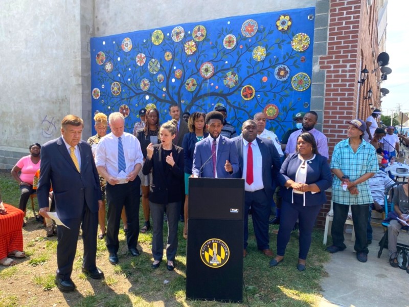 Baltimore Mayor Brandon Scott, center, and local lawmakers at the Rose Street Community Center in Baltimore, Md., at an event to mark the release of Scott's Baltimore City Comprehensive Violence Prevention Plan.