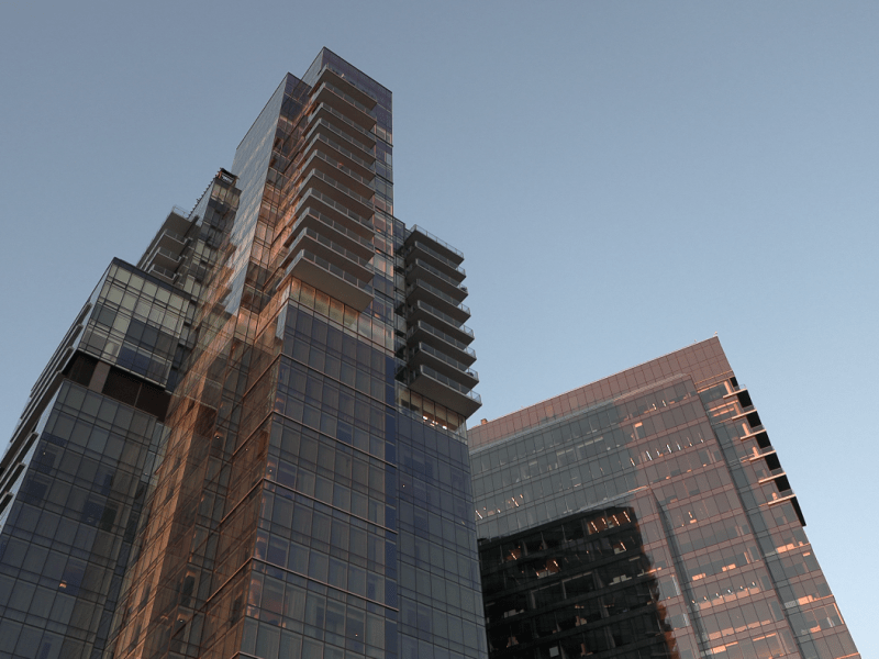 Photo from below of a skyscraper.