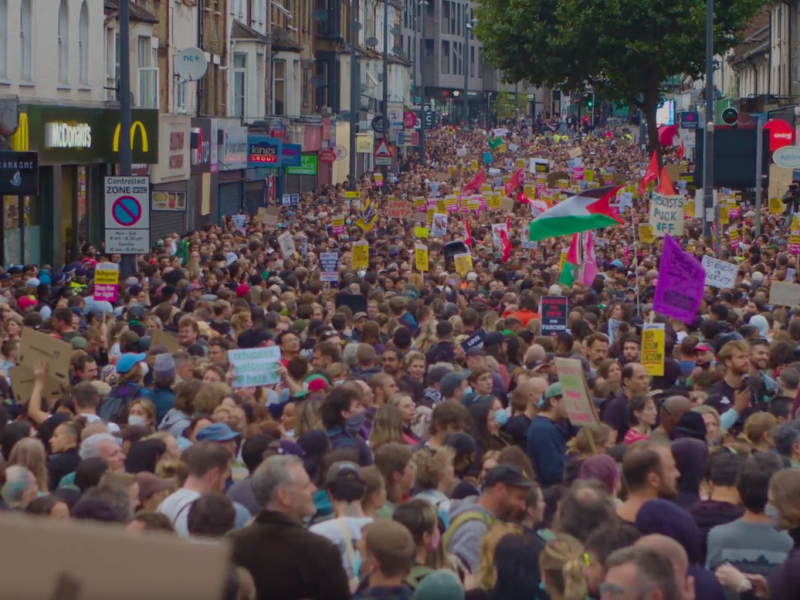 A massive crowd of anti-racist protesters gather on a London street to oppose the nationwide upsurge in violence by fascist gangs.