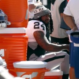 Raiders’ Marshawn Lynch Stays Seated During the National Anthem